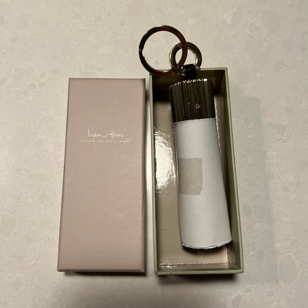 India Hicks black tassle